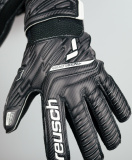 Reusch Attrakt Resist Finger Support Junior 5272610 7700 black 5